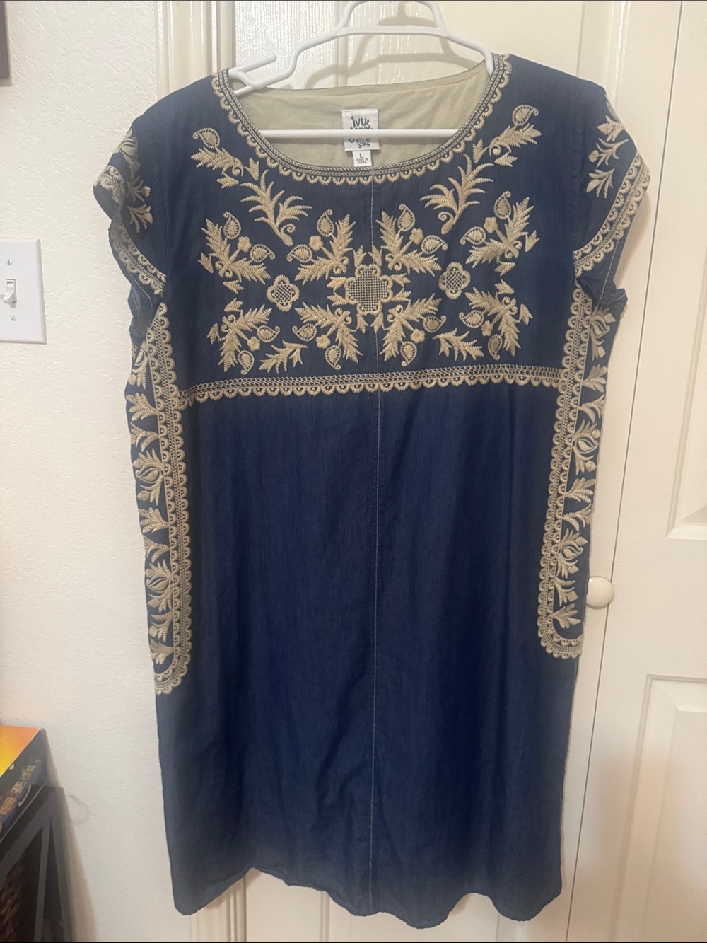 Navy Dress with Cream Floral Embroidery 47 in around the bust 
Length 38 in.